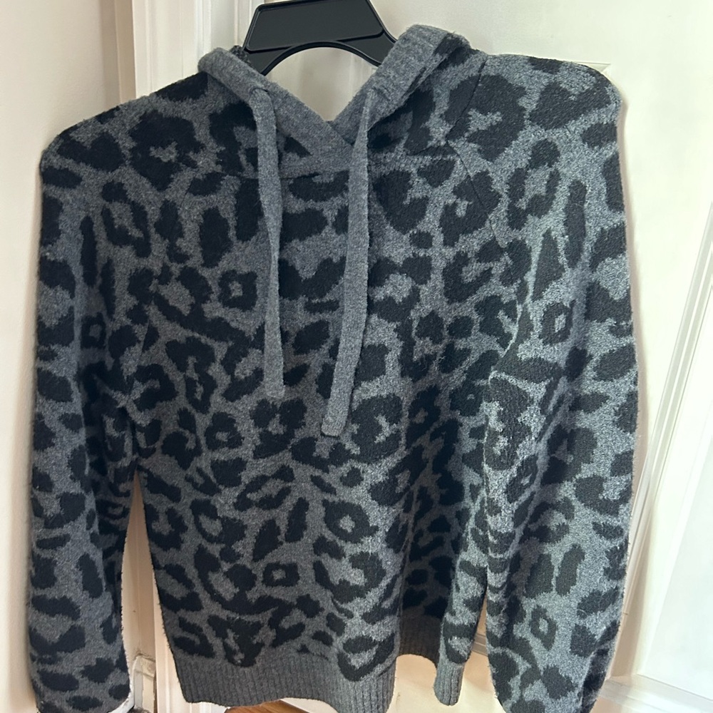 Women’s Size Small hooded pullover. Sweater material.